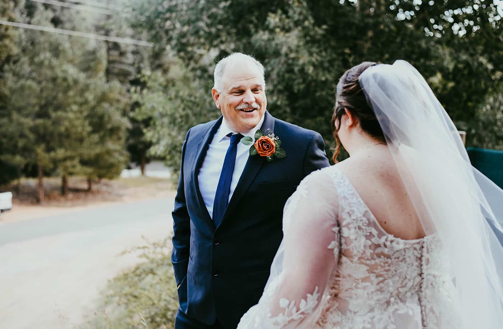 father-of-bride-first-look-savannah-mike-real-weddings-colorado-wedding-visual–poetry-by-meghan-chelsey-huff-design-blog