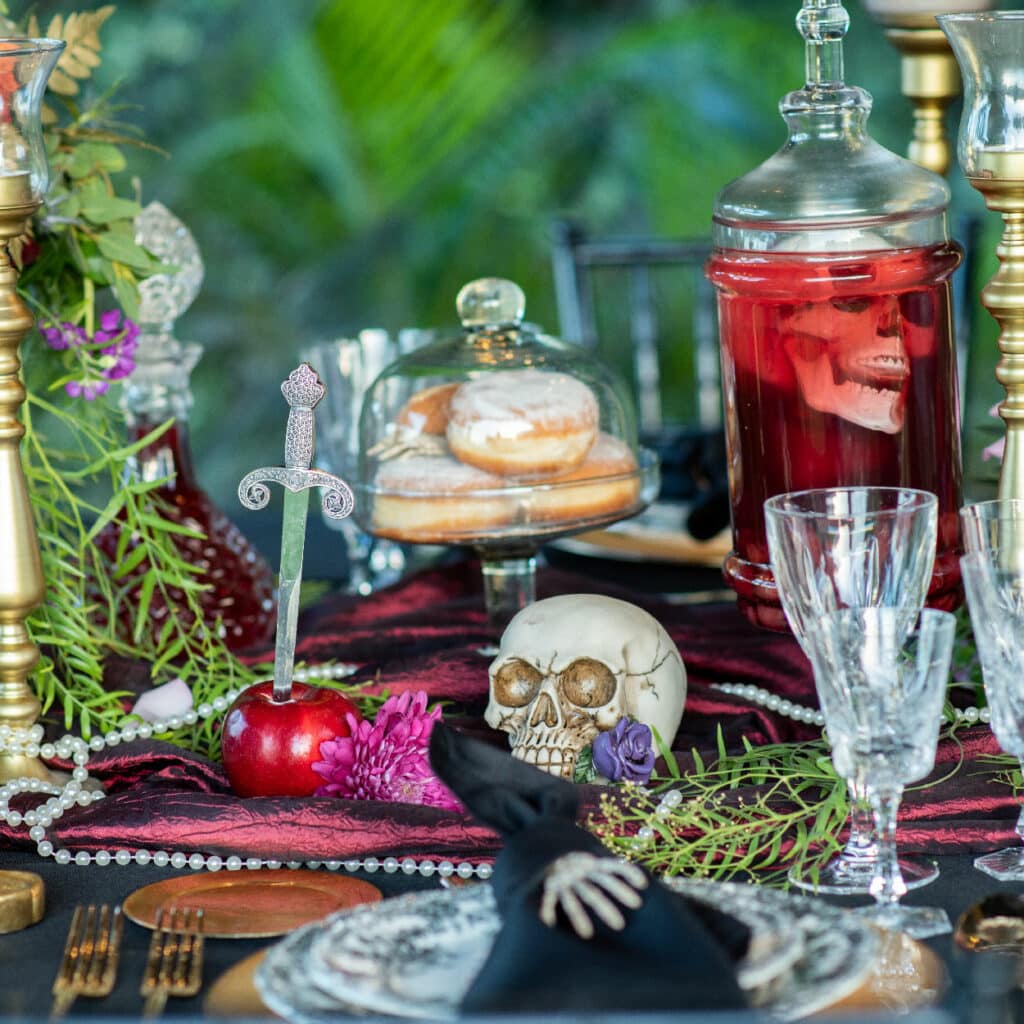 table-with-skulls-and-tableware-chelsey-huff-design-blog